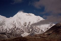 
Here is the South Col (8000m) and Everest Kangshung East Face from Makalu Base Camp in the Kama Valley in Tibet. The British mountaineer George Mallory passed through Kharta in 1921 trying to crack Everest’s defenses. He continued up the Kharta Valley and when he saw the Kangshung Face, he commented: “other men, less wise, might attempt this way if they would, but, emphatically, it is not for us”. It was for Stephen Venables who climbed it in 1988.
